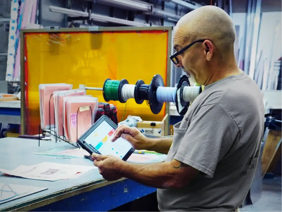 Do I Need an ERP System? The Importance of Digital Business Solutions Over Pen and Paper 1 small business sign shop erp